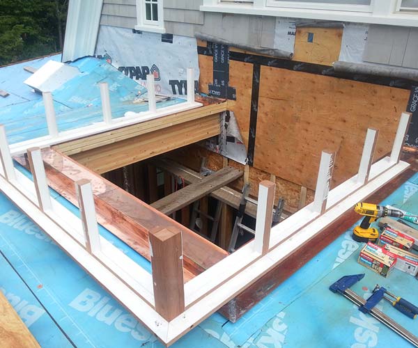The residential skylight frame has been installed on the job site in preparation for the next set of skylight elements